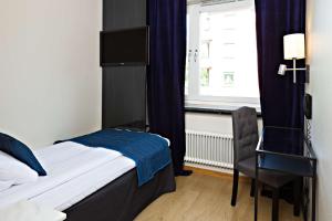 Säng eller sängar i ett rum på Hotel Allén - Sure Hotel by Best Western Allen