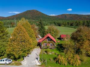 an aerial view of a house in the mountains at Magnus Lupus in Korenica