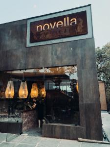 a restaurant with a sign that reads novella at Novella in Varkala