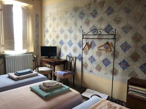 TV a/nebo společenská místnost v ubytování Casa Marcè a "Sonno"