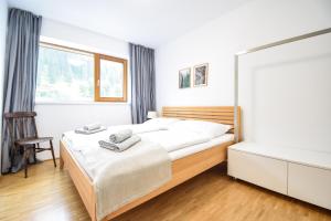 Postel nebo postele na pokoji v ubytování Toferer Textil
