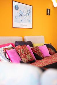 A bed or beds in a room at Simabo's Backpackers' Hostel