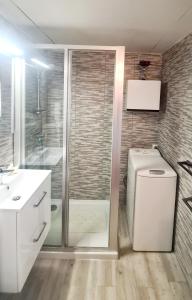 Ванная комната в VUE MER EXCEPTIONNELLE - GRANDE TERRASSE et PISCINE
