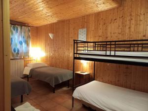 Ένα ή περισσότερα κρεβάτια σε δωμάτιο στο HOTEL LE CRET