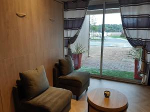 Istumisnurk majutusasutuses Gîte de la Presqu'île de Lézardrieux, adapté PMR