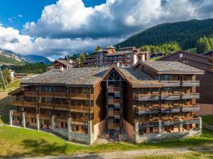 an aerial view of a building in the mountains at Noemys Backgammon in La Plagne