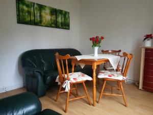 Posezení v ubytování Bungalow Weidling