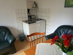 Kuchyň nebo kuchyňský kout v ubytování Bungalow Weidling