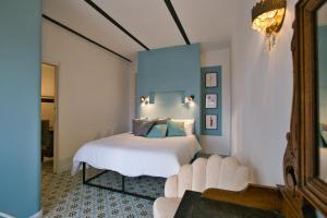 เตียงในห้องที่ Suite sul Lago