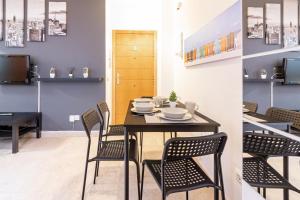 Televízia a/alebo spoločenská miestnosť v ubytovaní San Rafael 1 Apartments