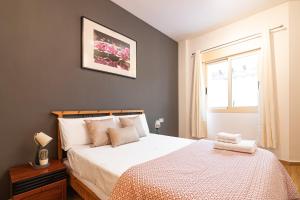 Posteľ alebo postele v izbe v ubytovaní San Rafael 1 Apartments