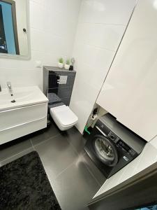 Kúpeľňa v ubytovaní Apartament Słoneczny