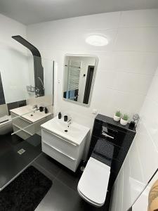 Koupelna v ubytování Apartament Słoneczny
