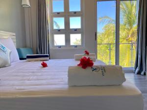 Uma cama ou camas num quarto em VIVA Beach and Spa MALDIVES