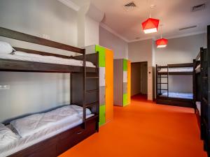 a room with three bunk beds and a hallway at BANANA'S CAMP in Cannes