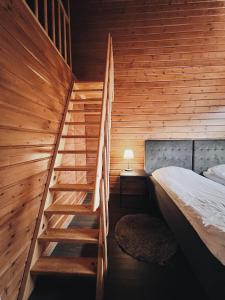 Кровать или кровати в номере Rieskapaikka