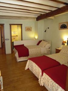 Postel nebo postele na pokoji v ubytování La Casa de la Abuela Clotilde