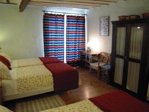 Postel nebo postele na pokoji v ubytování La Casa de la Abuela Clotilde