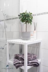 Koupelna v ubytování Appartement mit Netflix, Boxspringbett & Terrasse WE 17 + 17 fotografií