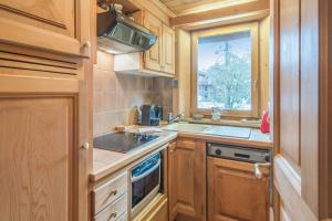 Kuchyňa alebo kuchynka v ubytovaní Appartement Lanura - Welkeys