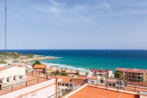 a view of the ocean from a building at TarracoHomes, TH163 Apartamento Via Augusta vistas al mar in Tarragona