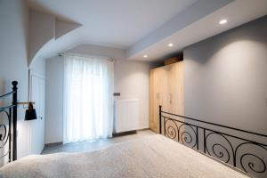 Postel nebo postele na pokoji v ubytování Onar House