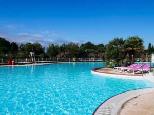 Fotografia z galérie ubytovania Spacieux Mobilhome 843 6-8pers de 45m² dans Camping 4* v destinácii Gastes + 8 fotografií