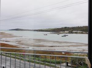 a view of a body of water with boats in it at The Teifi Waterside Hotel in Cardigan