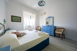 Posteľ alebo postele v izbe v ubytovaní Casa Roberta