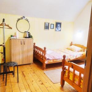 Ένα ή περισσότερα κρεβάτια σε δωμάτιο στο Apartmani Božana Vojinović