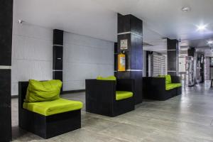 Uma área de estar em Hotel Onix T