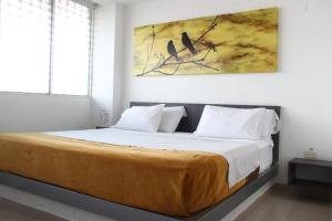 Uma cama ou camas num quarto em Hotel Onix T