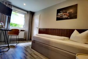 Voodi või voodid majutusasutuse Hotel Wandersleben - Erfurt toas