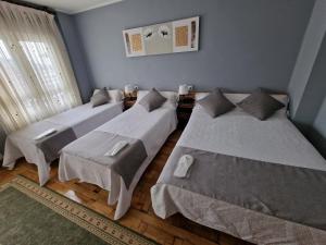 Postel nebo postele na pokoji v ubytování Hostal Fidalgo