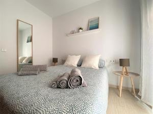 Posteľ alebo postele v izbe v ubytovaní Apartamento Felipe Neri 10