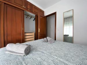 Posteľ alebo postele v izbe v ubytovaní Apartamento Felipe Neri 10
