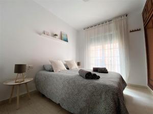 Posteľ alebo postele v izbe v ubytovaní Apartamento Felipe Neri 10