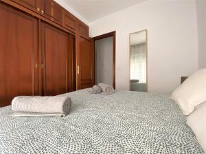 Posteľ alebo postele v izbe v ubytovaní Apartamento Felipe Neri 10