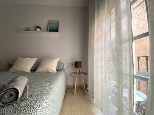 Posteľ alebo postele v izbe v ubytovaní Apartamento Felipe Neri 10