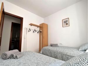 Posteľ alebo postele v izbe v ubytovaní Apartamento Felipe Neri 10