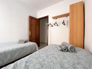 Posteľ alebo postele v izbe v ubytovaní Apartamento Felipe Neri 10