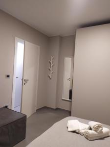 Postel nebo postele na pokoji v ubytování La Maison de Ginny