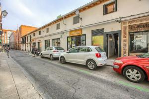 three cars parked on the side of a street at AP Plaza de España 5 in Madrid