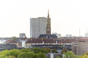 Nespecifikovaný výhled na destinaci Kodaň nebo výhled na město při pohledu z apartmánu