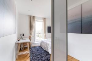 Postel nebo postele na pokoji v ubytování Penthouse with amazing views of Copenhagen!MH74