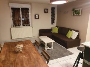 Posezení v ubytování Ecully, appartement au calme de 50m².