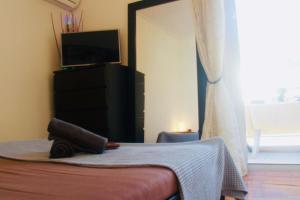 Posteľ alebo postele v izbe v ubytovaní Penthouse with Sea View