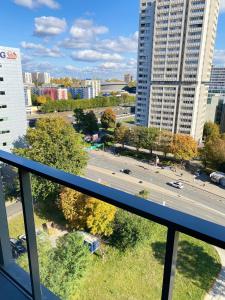 a view of a city street from a window at Apartament City Spa - Sokolska 30 Towers in Katowice