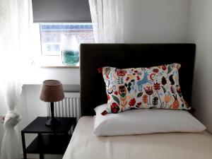 Ein Bett oder Betten in einem Zimmer der Unterkunft Hotel JUMAs