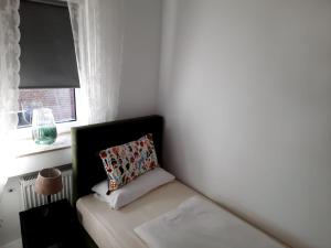 Ein Bett oder Betten in einem Zimmer der Unterkunft Hotel JUMAs